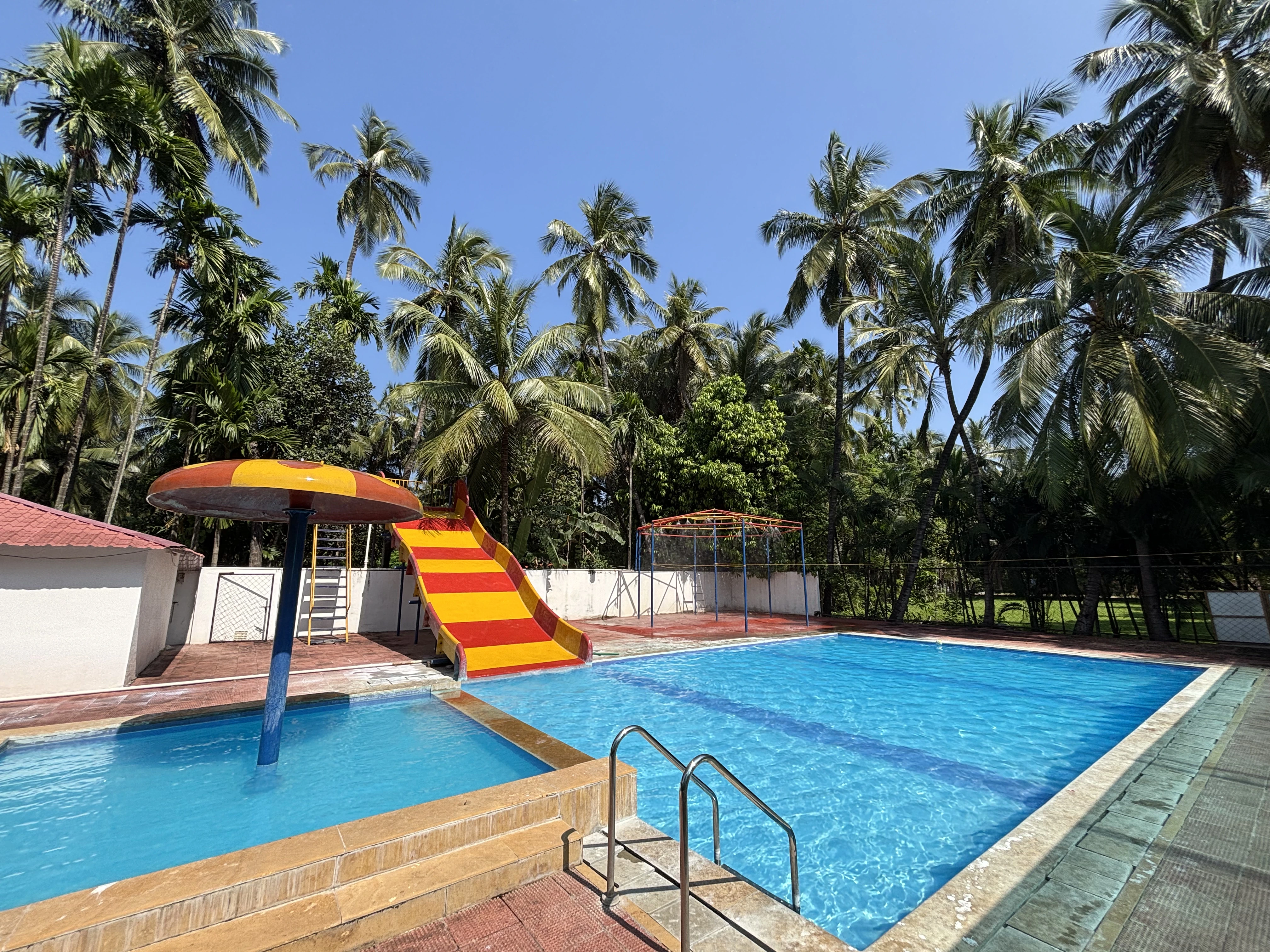 Premium swimming pool at Raj Resort Kelva Beach